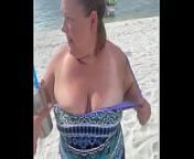 Slutty Bbw duca wife flashes her big tits on a public beach from bbw public