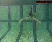 Blackhaired beauty Irina underwater from family nudist beauty pageants
