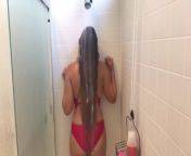 Red swimsuit plastic leather and long hair bathing suit and bare feet fun from long hair bathing